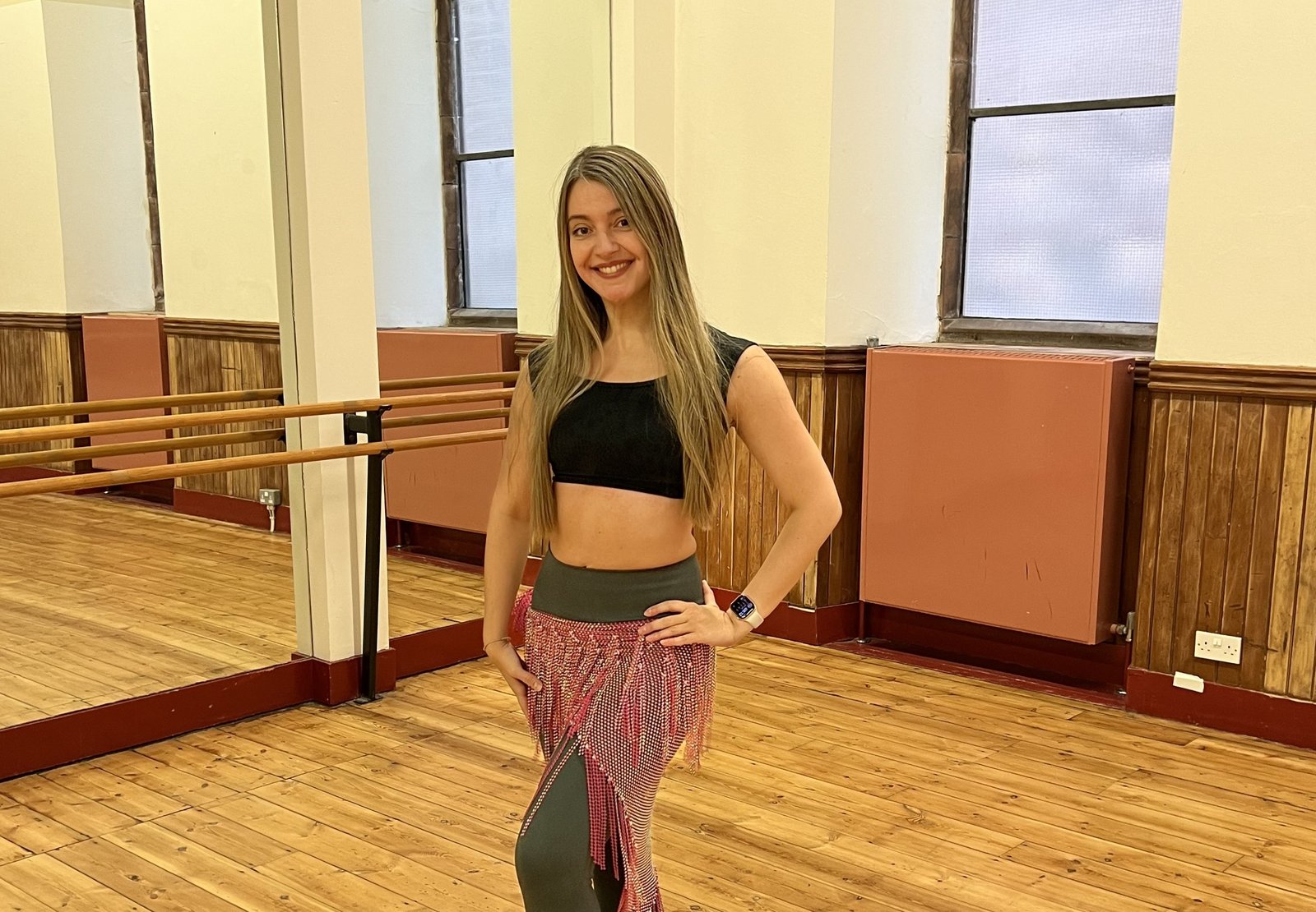 Belly dance taster class Edinburgh: teacher in the hall at St Oswald's Centre